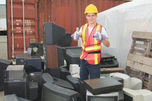 Professional flat clearance team removing furniture