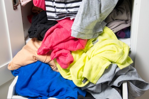 Safe loading and securement of business waste on a collection truck